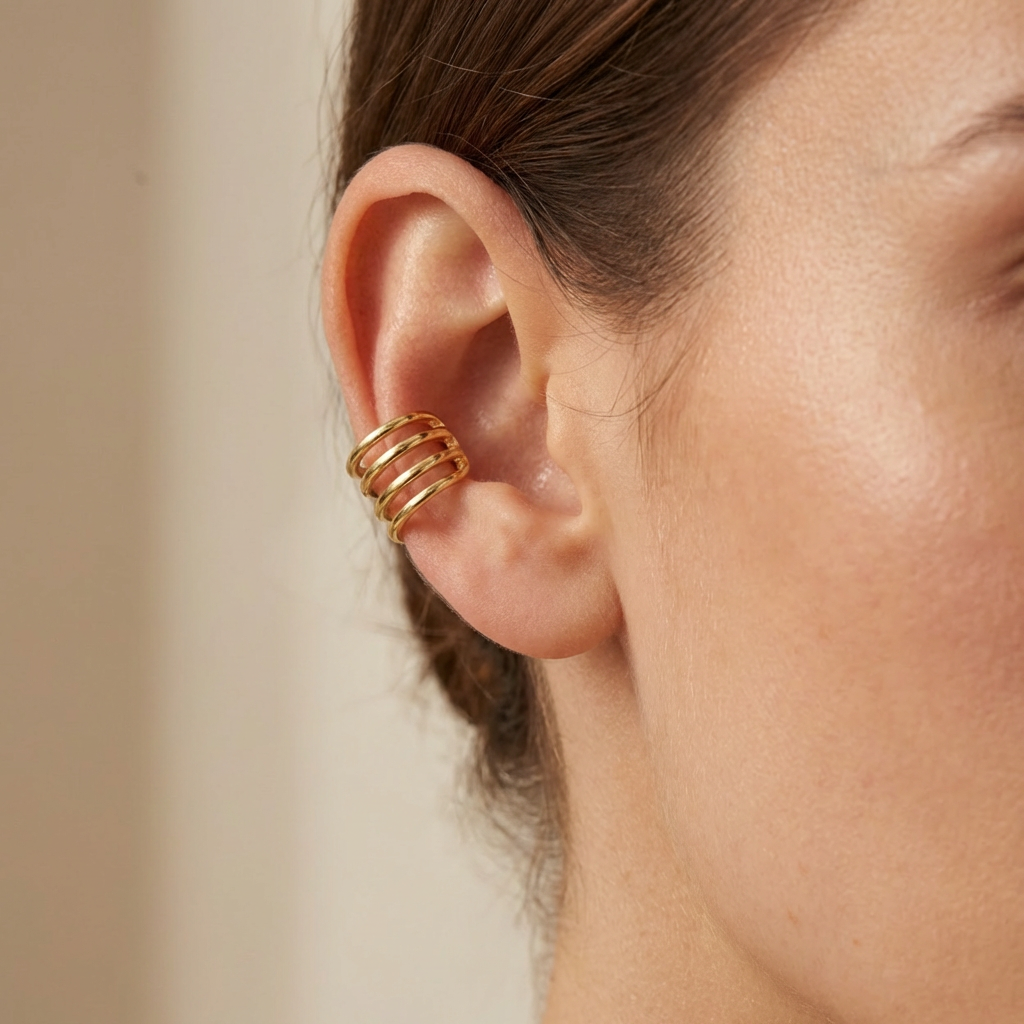 Earcuff de Oro 14k Hueco Trepador Diseño Resorte Tubular y Briilante mod. 10609