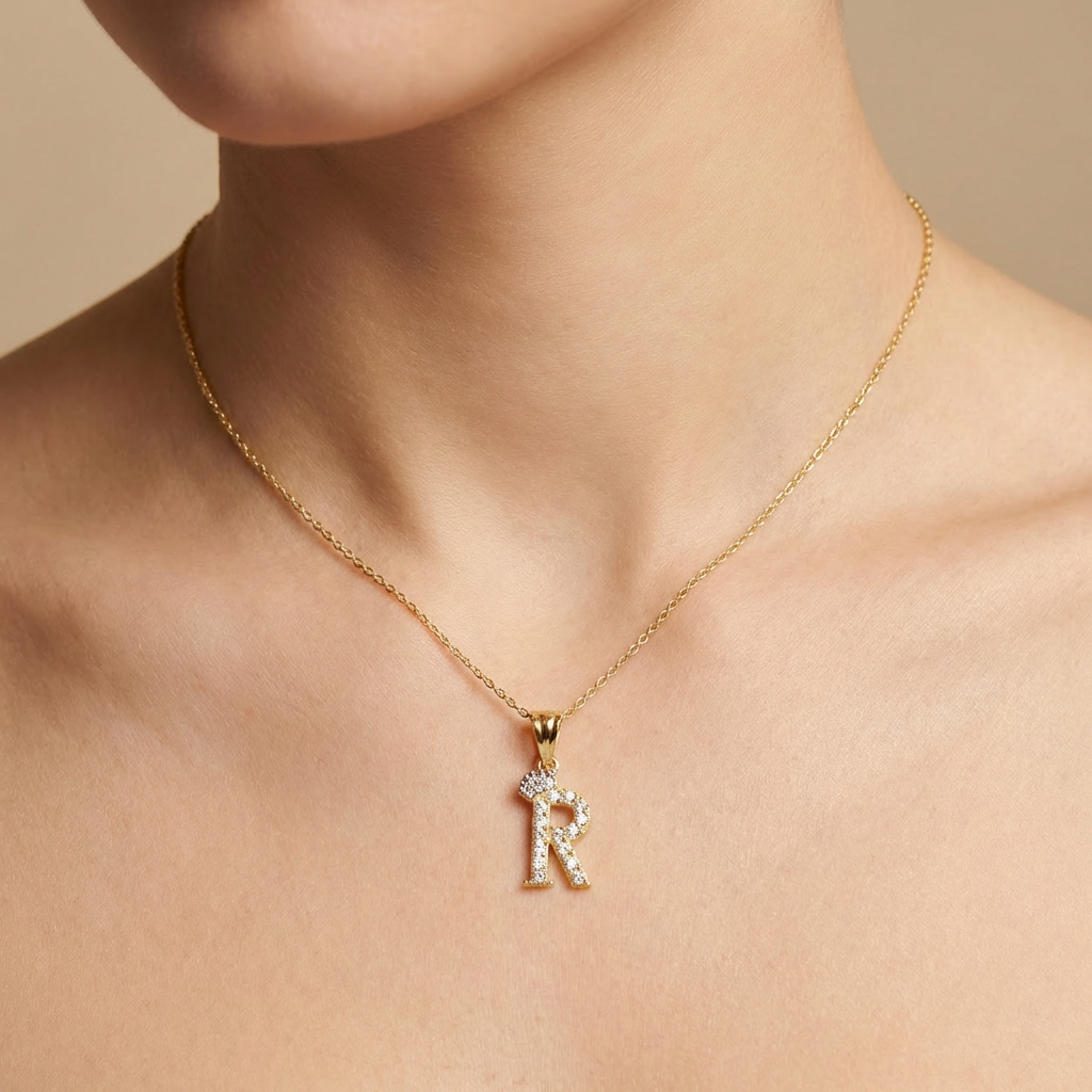 Dije de Oro 14k Modelo de Inicial R Diseñado con Corona e Incrustación de Zirconias mod. 10572