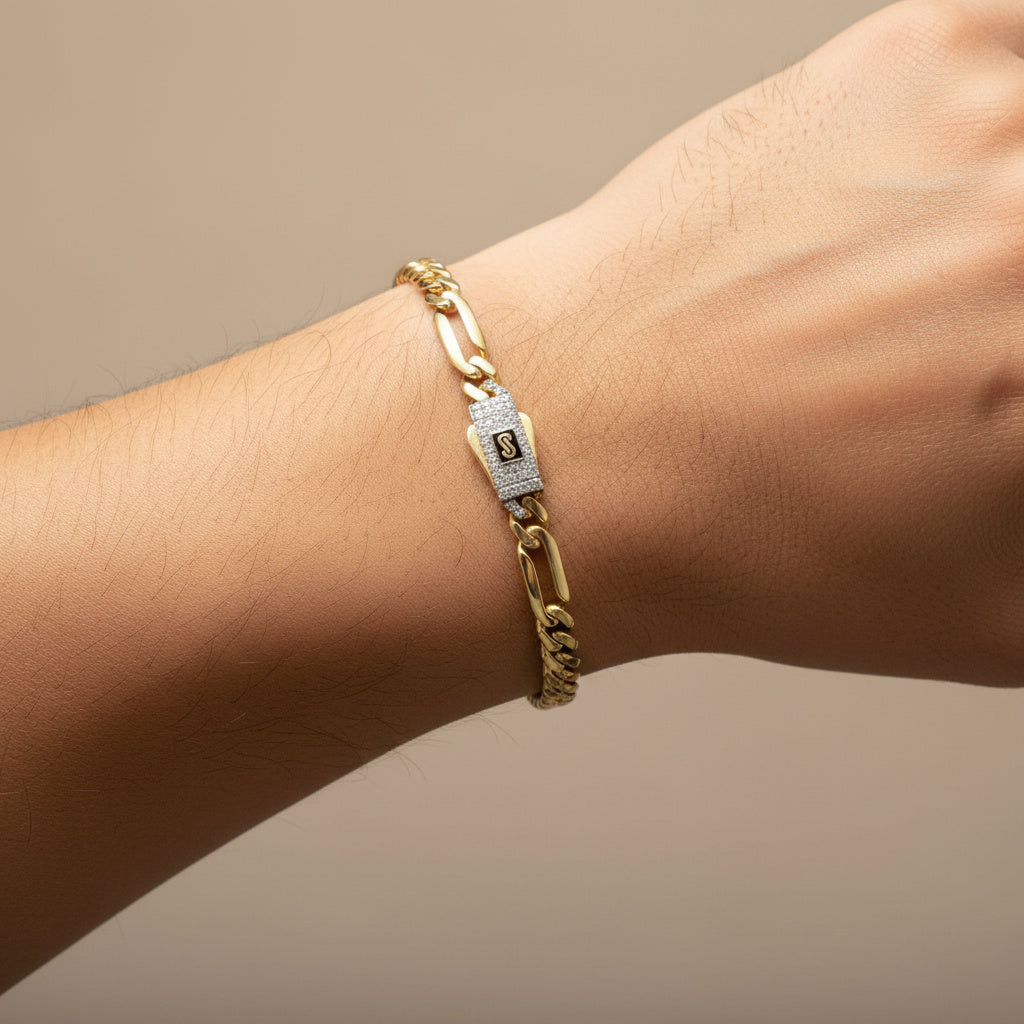 Pulsera Monaco Chain de Oro 14k Hueco Modelo Figaro 5x1 con Broche Pavé Swarovski mod. 10327
