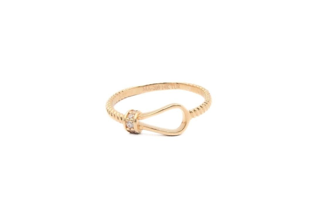Anillo de Oro Rosa con Diseño de Cuerda Incrustado de Zirconias mod. 5992 - Joyería Orovel’s