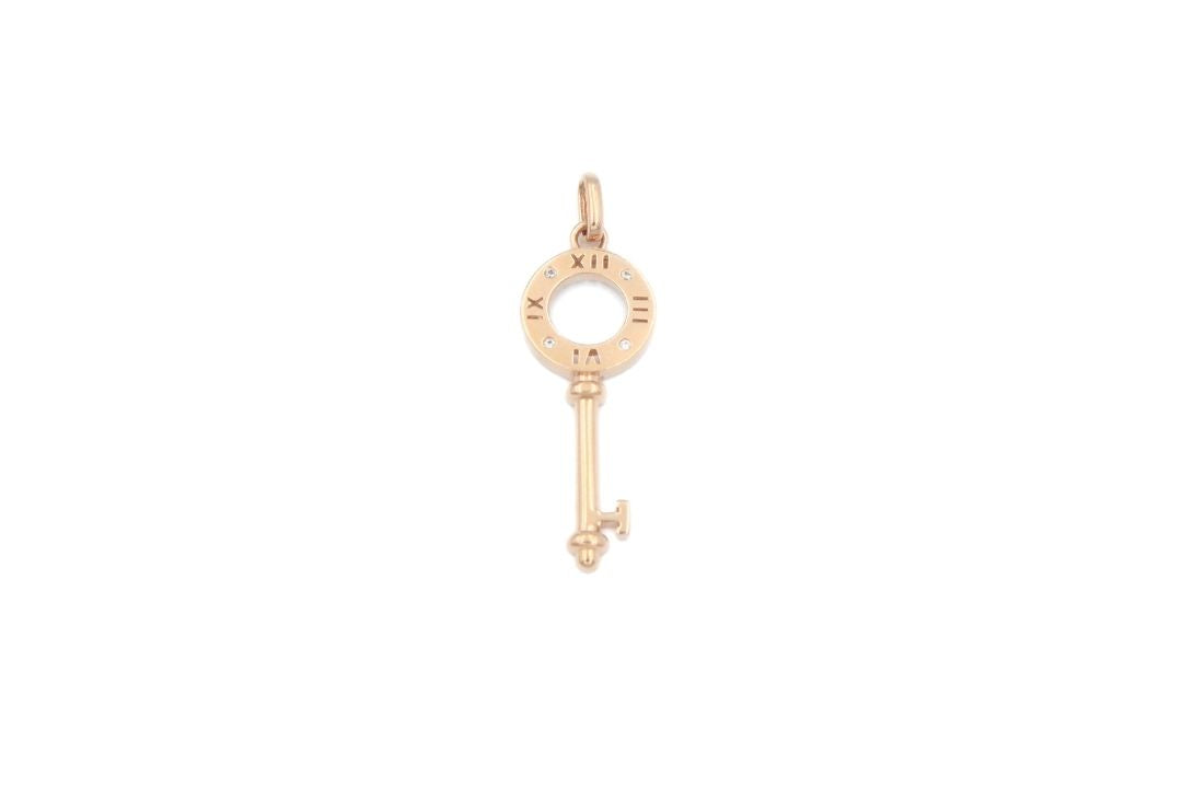 Dije Llave con Números Romanos en Círculo en Oro Rosa mod. 6354