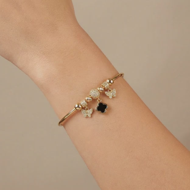 Pulsera de Oro 14k Tubular Hueca de Diseño Abierto Detallado con Trébol, Charms y Zirconias mod. 10668