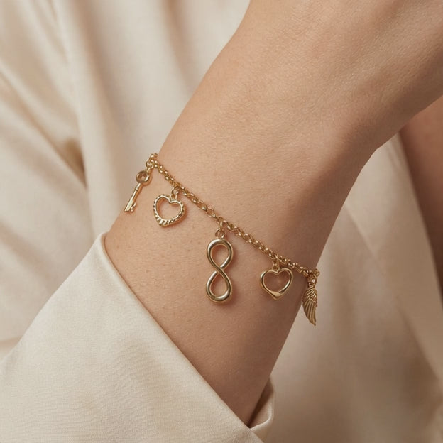 Pulsera de Oro 14k con Colgantes de Corazones e Infinito mod. 10968