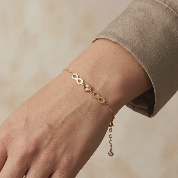 Pulsera de Oro 14k con Infinitos y Corazón Diamantado mod. 10973