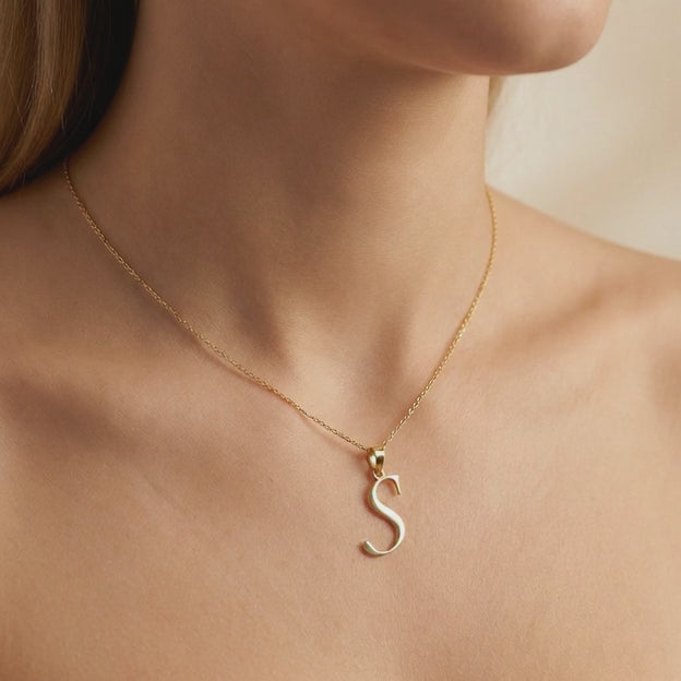 Dije de Oro 14k Modelo de Inicial S Estilo Cursiva Lisa y Brillante mod. 10555