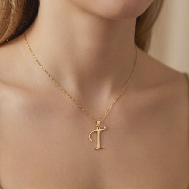 Dije de Oro 14k Modelo de Inicial T Estilo Cursiva Lisa y Brillante mod. 10556
