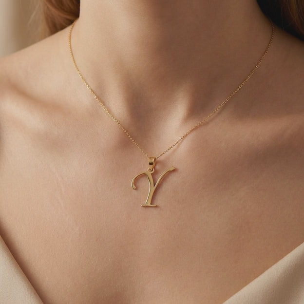 Dije de Oro 14k Modelo de Inicial Y Estilo Cursiva Lisa y Brillante mod. 10558
