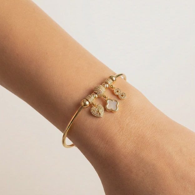 Pulsera de Oro 14k Tejido Tubular Hueco de Diseño Abierto con Charms y Zirconias mod. 10667