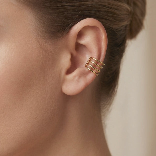 Earcuff de Oro 14k Hueco Trepador Diseño Resorte Tubular y Briilante mod. 10609