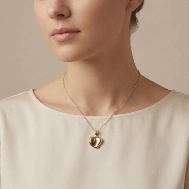 Dije de Oro 14k Corazón de Diseño Ondulado Hueco de Estilo Brillante mod. 10809