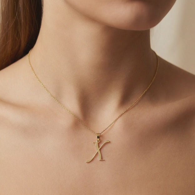 Dije de Oro 14k Modelo de Inicial X Estilo Cursiva Lisa y Brillante mod. 10557