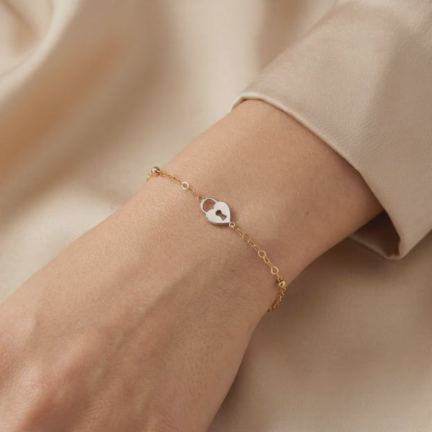 Pulsera de Oro 14k Candado de Corazón en Oro Blanco mod. 11047