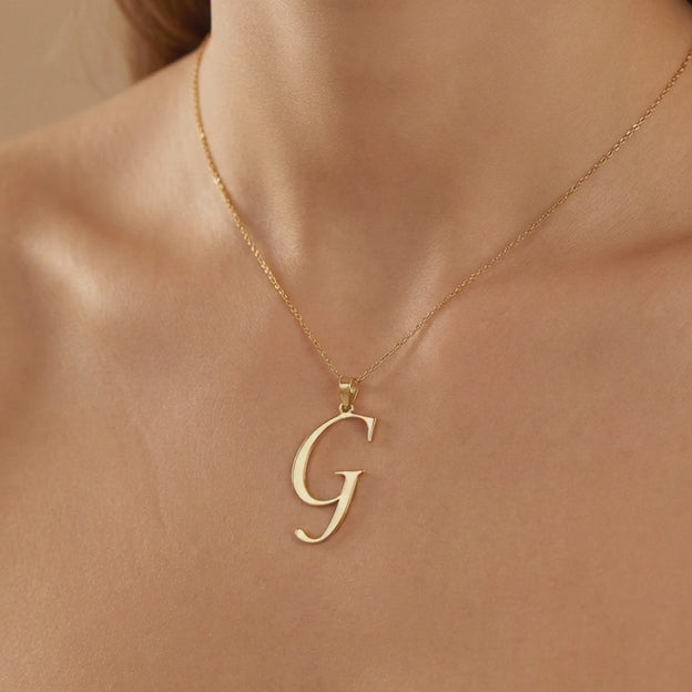 Dije de Oro 14k Modelo de Inicial G Estilo Cursiva Lisa y Brillante mod. 10553